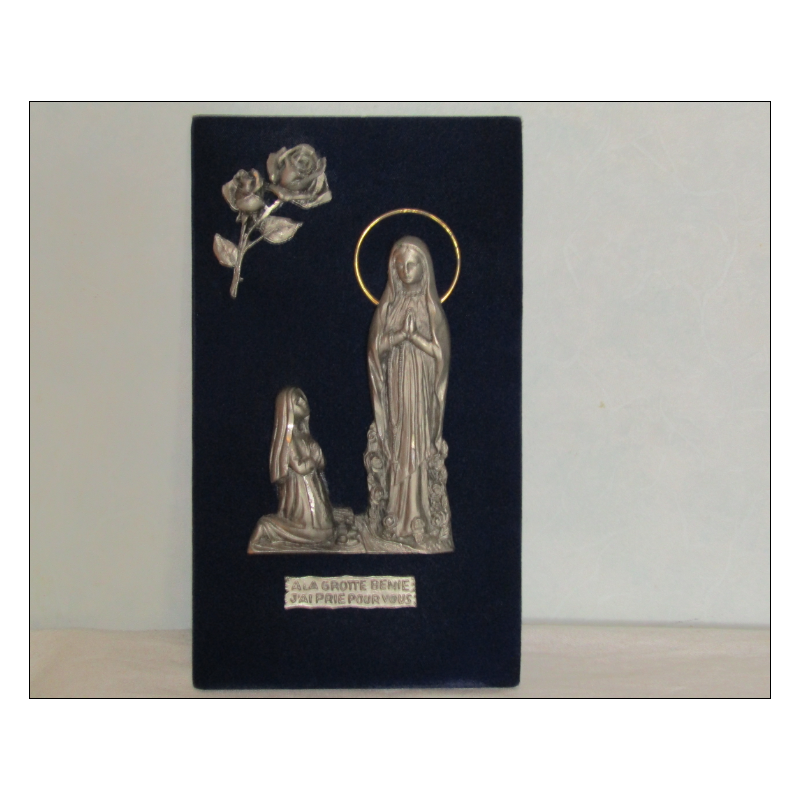 Representation of the Apparition of Lourdes in chased pewter on blue velvet