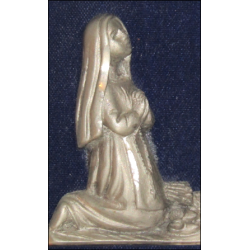 Representation of the Apparition of Lourdes in chased pewter on blue velvet