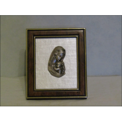 Small Virgin and Child display frame in chiseled pewter on grey fabric