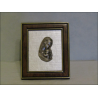 Small Virgin and Child display frame in chiseled pewter on grey fabric