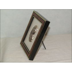 Small Virgin and Child display frame in chiseled pewter on grey fabric