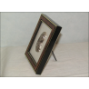 Small Virgin and Child display frame in chiseled pewter on grey fabric