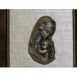 Small Virgin and Child display frame in chiseled pewter on grey fabric