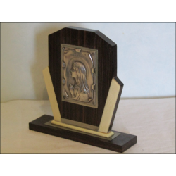 Wooden display stand with silver-plated medallion of the Praying Virgin