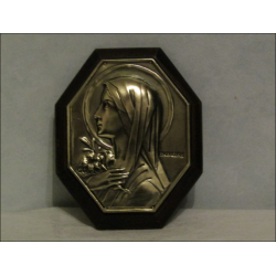 Petit cadre en bois et bronze de la Vierge au lys signé Parvillers
