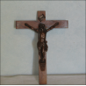 Crucifix in oak wood and bronze with brown patina 16 cm